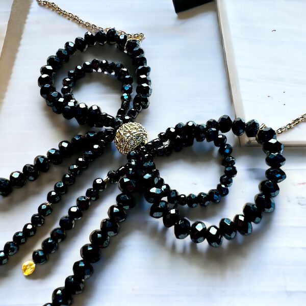 Sparkling bow black & gold
