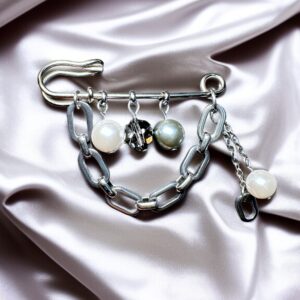 Petite Lumière Brosche